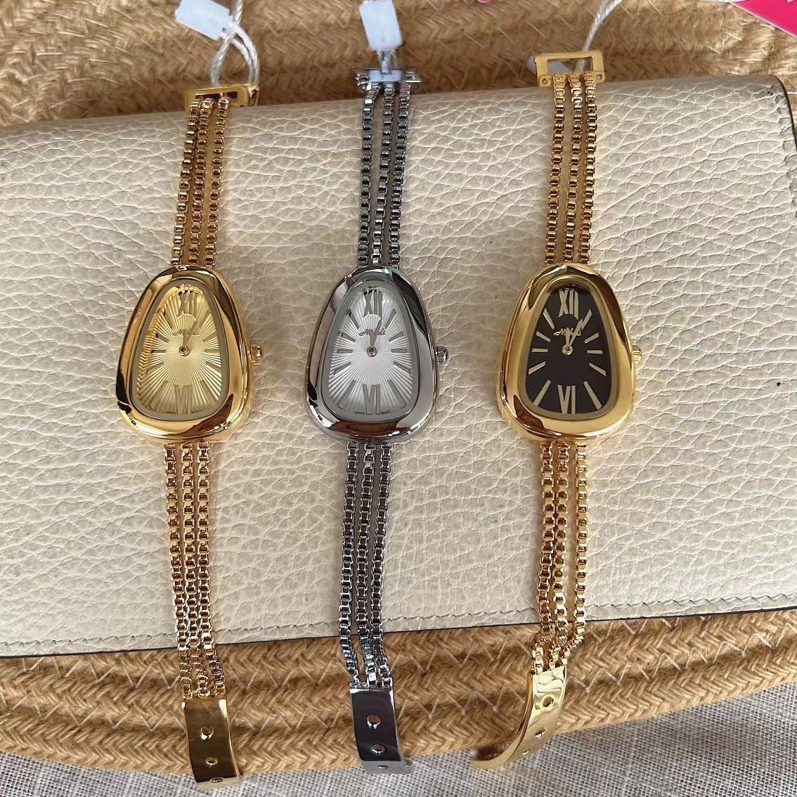 Snake Head High-grade Tassel Chain Women's Quartz Watch ( Free shipment, 10 days Shipment, No DHL)